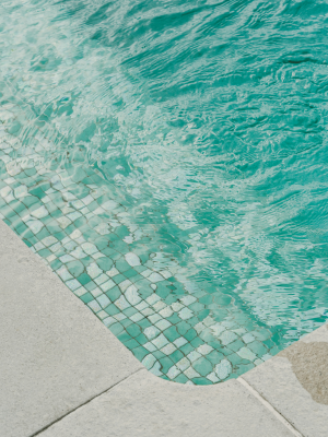 Weekly pool and spa cleaning service showing clean water and tile edge